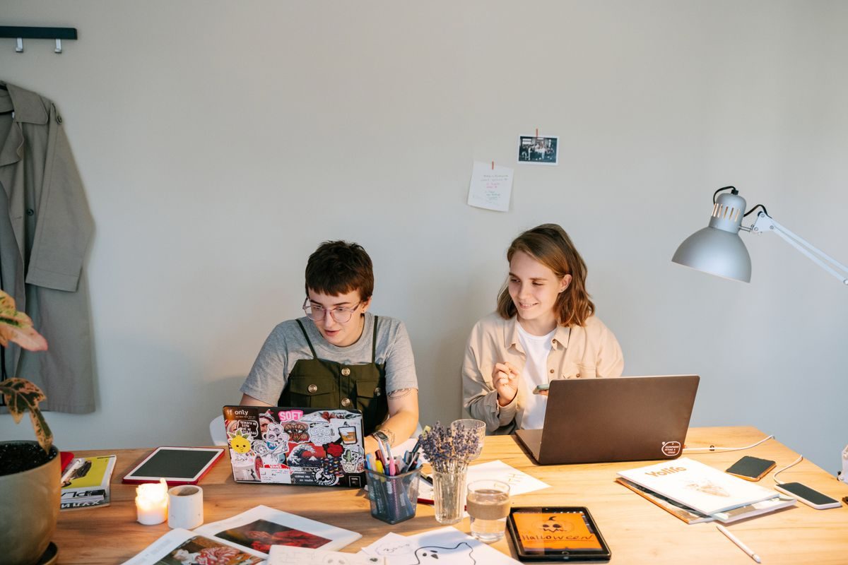 A team working together at a long desk